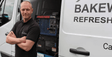 John Bakewell stood in front of his van John Bakewell stood in front of his van